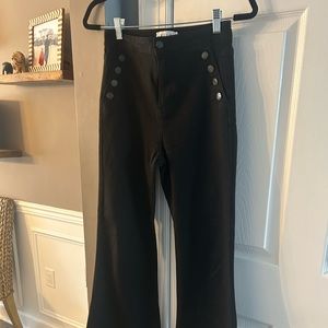 Cello black jeans with flares bottoms.  Size 5.